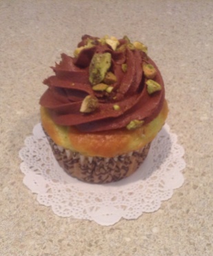 Pistachio Cupcake with Chocolate Cream Cheese Frosting Garnished with Pistachios
