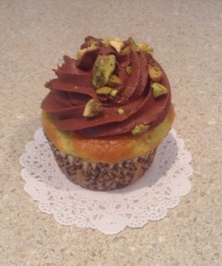 Pistachio Cupcake with Chocolate Cream Cheese Frosting Garnished with Pistachios